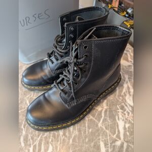 Dr. Martens Black Leather Boots with Yellow Stitching